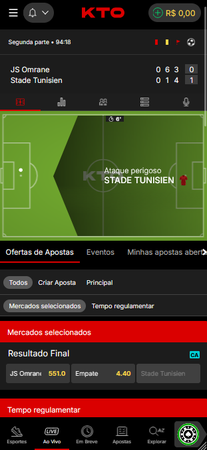 O app da KTO mostrando uma partida ao vivo entre JS Omrane e Stade Tunisien. O campo virtual exibe um ataque perigoso do Stade Tunisien, com opções de apostas ao vivo e odds para o resultado final