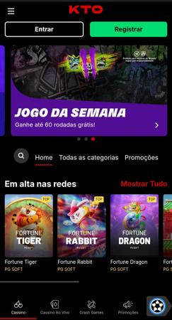 Tela do cassino KTO com banner do jogo da semana e seção “Em alta nas redes” com jogos como Fortune Tiger e Fortune Dragon.