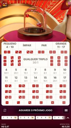 Jogo ao vivo Mega Sic Bo da Pragmatic Play com mesa de apostas exibindo combinações de dados e opções como par, ímpar, pequeno e grande.